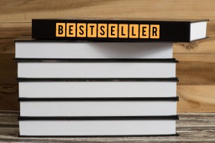 A stack of books with the top one called Bestseller on its spine
