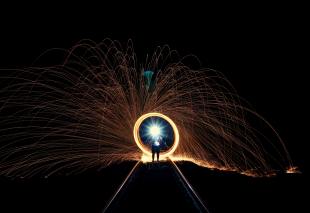 A circle of sparks on a main road