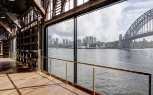 Interior to exterior view of a venue overlooking Sydney harbor