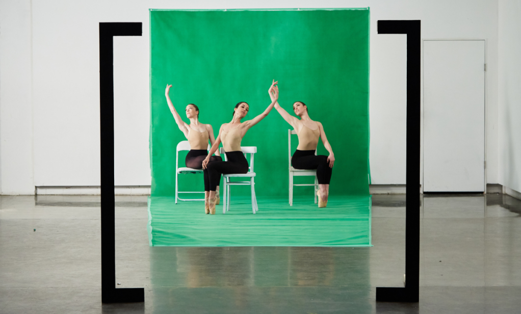 Performers against a green screen
