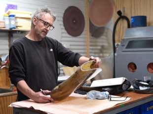 Tom Malone Prize winning glass artist Tim Edwards in his studio.