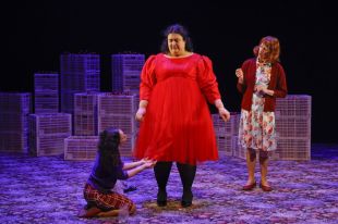 Three female performers on stage as part of Looking For Albrandi the stage play