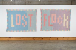exhibition of textiles work by Deborah Prior with words Lost Flock
