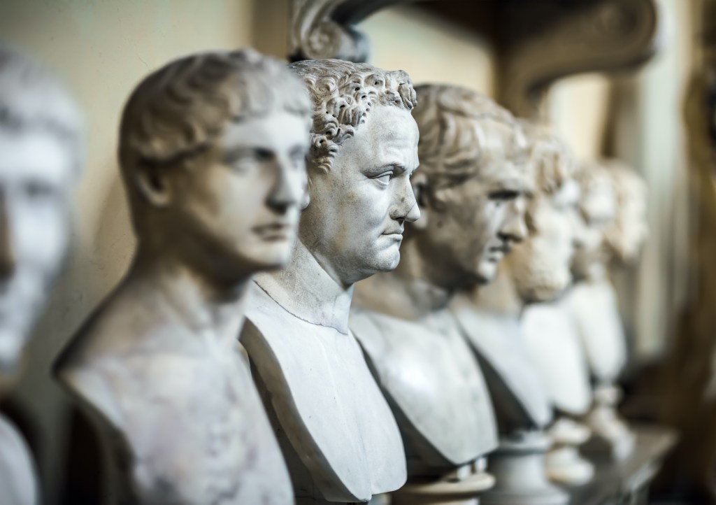 display of marble sculpture busts