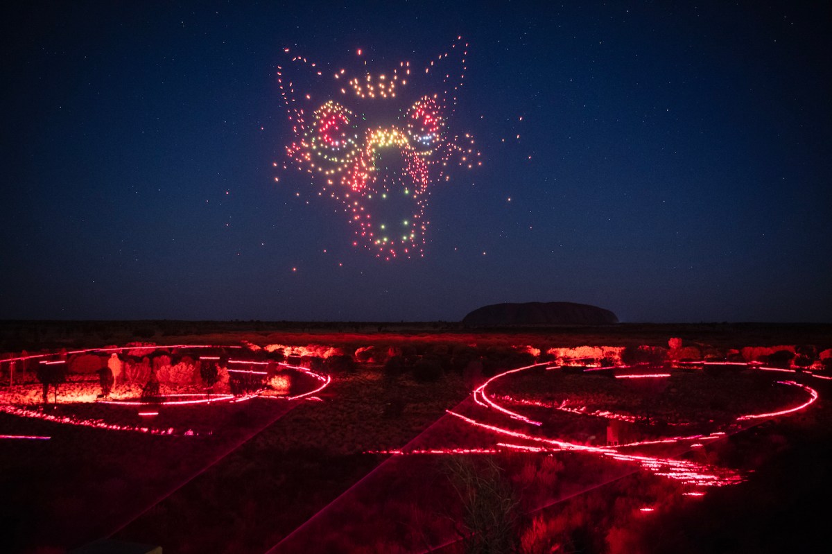 Light show at Uluru as shape of a dog.