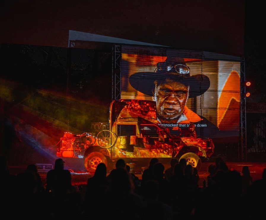 Scene from The Journey Down performance (projection features Gija artist Gordon Barney).