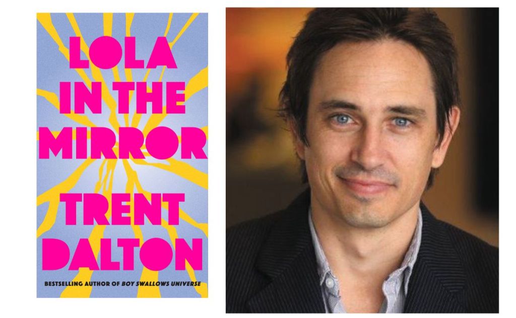 Lola in the Mirror. Image is book cover on left with headshot on writer of man with dark hair and jacket, and open necked shirt.