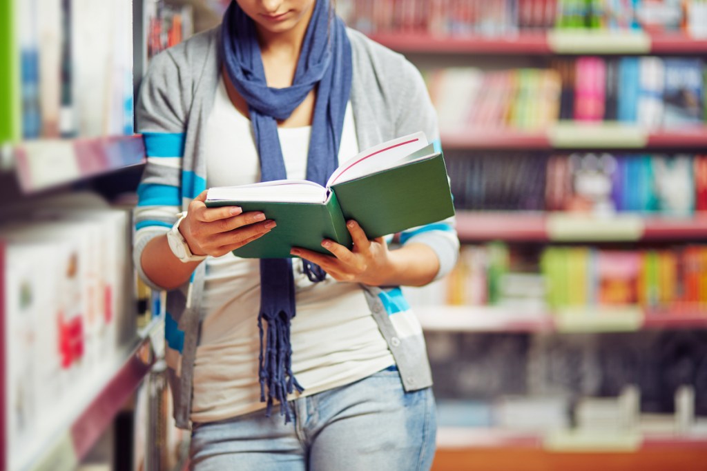 Reading book in library