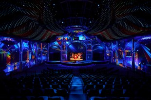 projected imagery around a venue recreating a circus like environment.