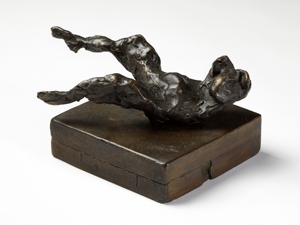 One of three small bronze sculptures in the NGV Triennial. Tracey Emin, ‘Wanting’, 2014. Image: Tracey Emin. Photo: White Cube (Ben Westoby). A bronze sculpture of an abstract human figure with back on a square block and legs slightly raised.