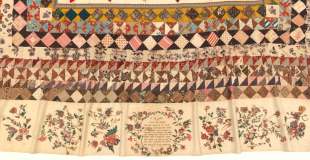 Kezia Hayter, Unidentified women of the convict ship, HMS Rajah, ‘The Rajah quilt’, 1841. National Gallery of Australia, gift of Les Hollings and the Australian Textiles Fund 1989. Image: Supplied. A patchwork quilt with floral motifs and lettering on the bottom centre.