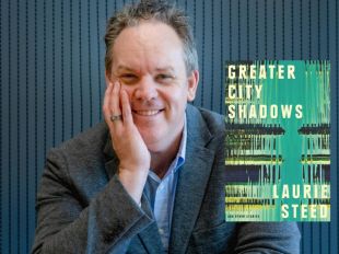 Greater City Shadows. Image is an author shot of a smiling middle aged man with a receding hairline resting his palm on his cheek and wearing a grey suit jacket over an open necked blue shirt. Inset is an image of the book cover, with an abstract green front.