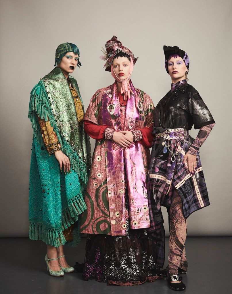 Three models wearing colour fashion designs. Sustainable fashion.