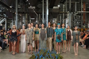 GIRP 'Ancetral Bloodlines' fashion show 2024. Photo: Supplied. A group of First Nations models wearing designs with organic fibres and natural materials in an industrial space.