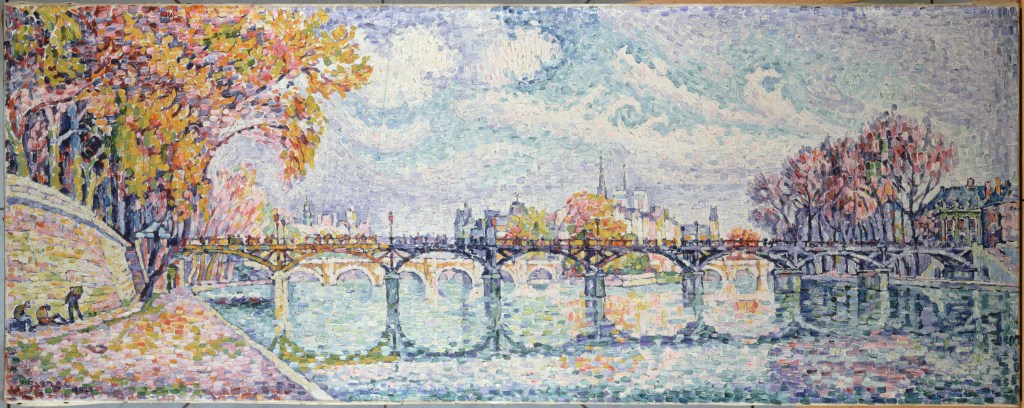 Paul Signac, ‘Pont des Arts’ 1928, oil on canvas. Image: Musée Carnavalet. CC0 Paris Musées/Musée Carnavalet – Histoire de Paris. A painting of a quiet river landscape featuring soft hues of blue, purple, yellow, purple in a pointed painting technique where each image is made up a dots of brushstrokes. The season appears to be autumn. 