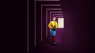 Big Yikes! Image is a young woman in a blue skirt and yellow jumper, upstage with a square tunnel like framing her.