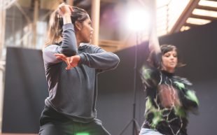 Rikki Milera-Wilson and Amber Ahang. Photo: James Cubillo. Two dancers rehearsing inside a light filled room.