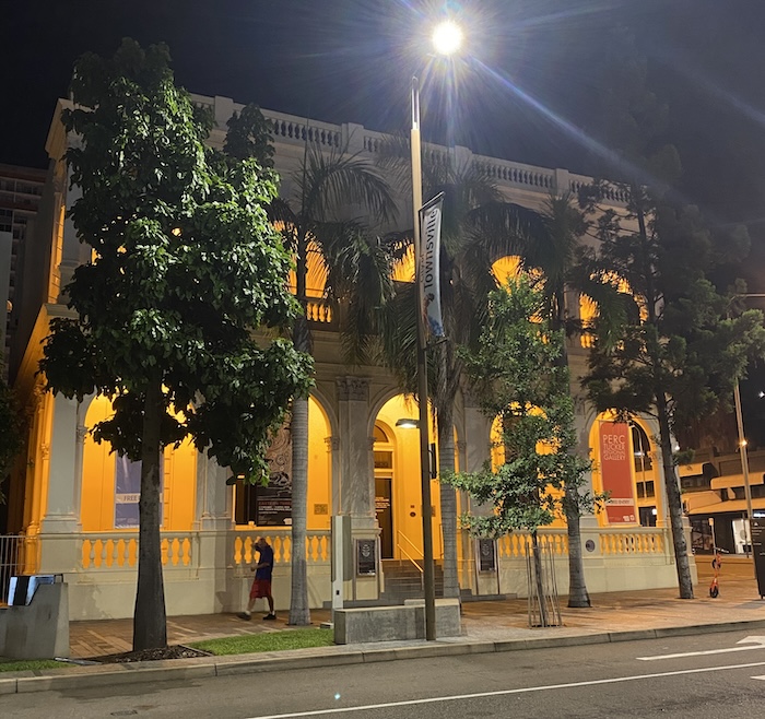 Exterior of heritage building with trees at night. Townsville gallery