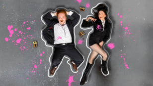 Dylan Murphy and Molly Daniels. A white man and white woman are lying on the ground with chalk outlines drawn around them and photographed from above. He wears a black suit and white shirt. She wears a black jacket, black stockings and knee length boots. They are both spattered with pink paint. MICF 2024