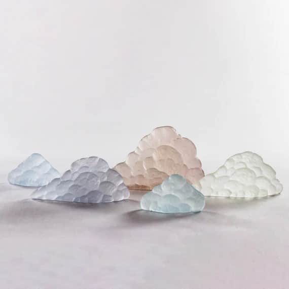 gallery gift shop. Glass cloud shapes in pastel colours.