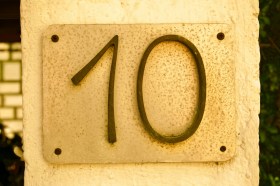 Miles Franklin Literary Award. Image is the number ten affixed to a yellow wall.