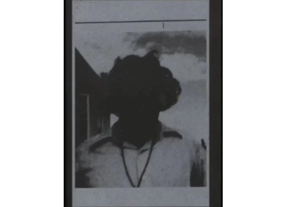 grey toned and blurred photo of Aboriginal woman. book cover.