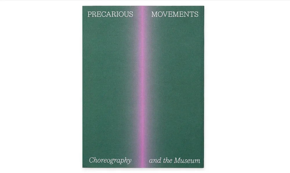 Green book cover with pink blurred light through the centre.