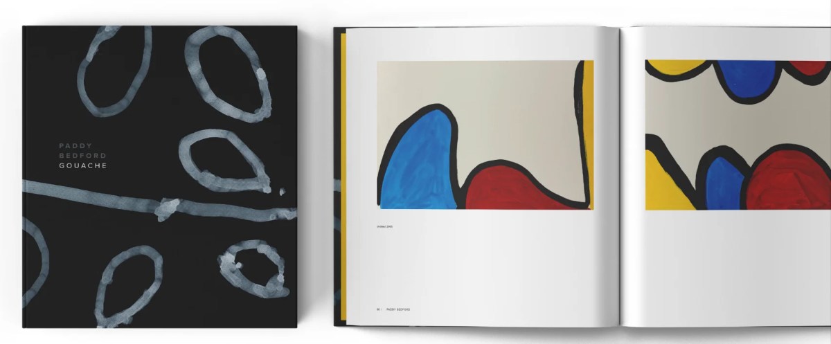 Black art book cover and view of colourful interior.