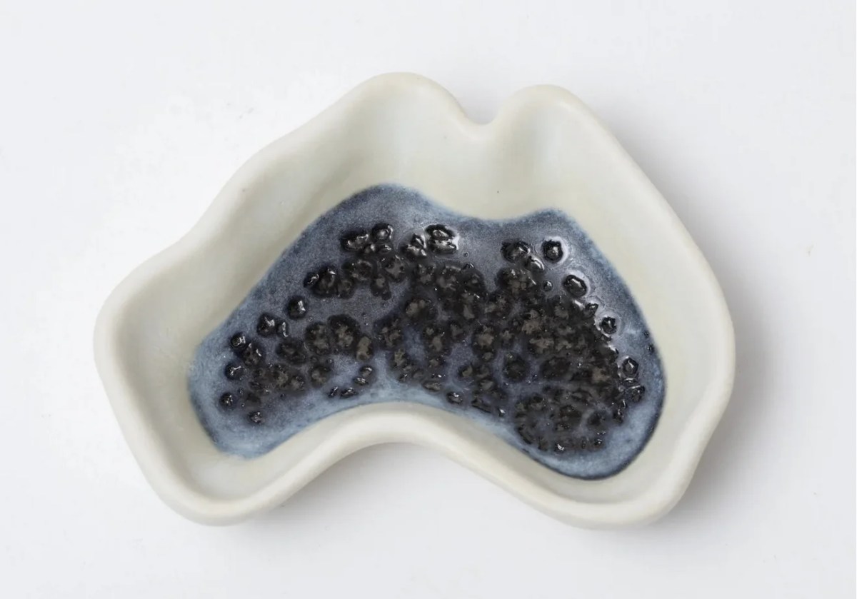Small ceramic dish in shape of Australia with blue and white glaze. art gift.