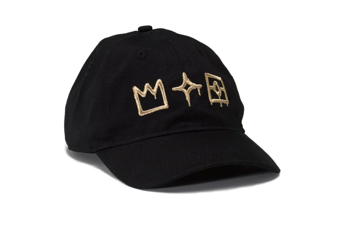 black baseball cap with gold embroidered design. art gifts