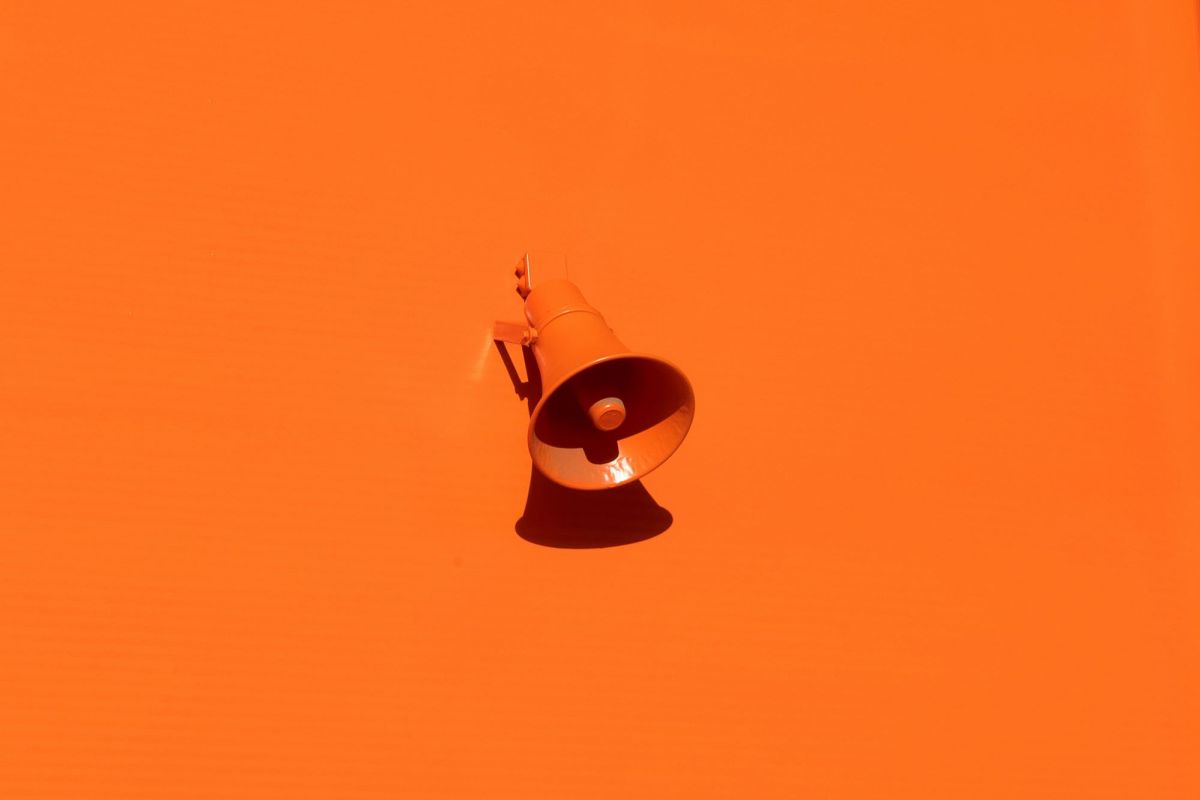 This week’s arts news and trending topics. The image depicts a plastic orange megaphone against an orange background.