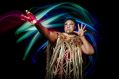Samuel Gaskin in the 2025 Midsumma Festival production 'HONŌUR'. The New Zealand born musician poses dramatically, hands raised and face painted, against a colourful backdrop.