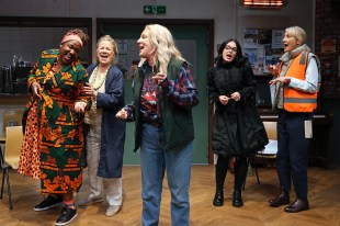 Five women in the cast of 'The Heartbreak Choir' singing.