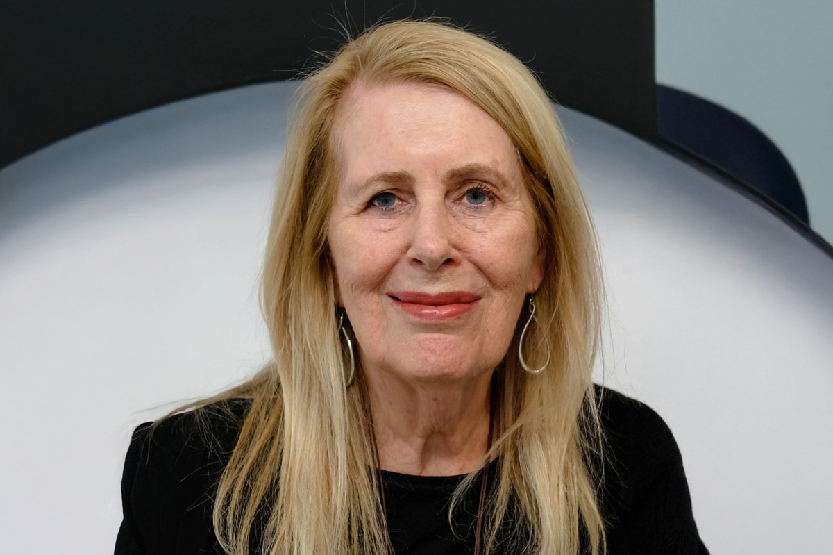 Anne Summers, a smiling woman with long blonde hair.
