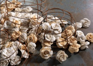cream coloured ceramic flowers in artwork.