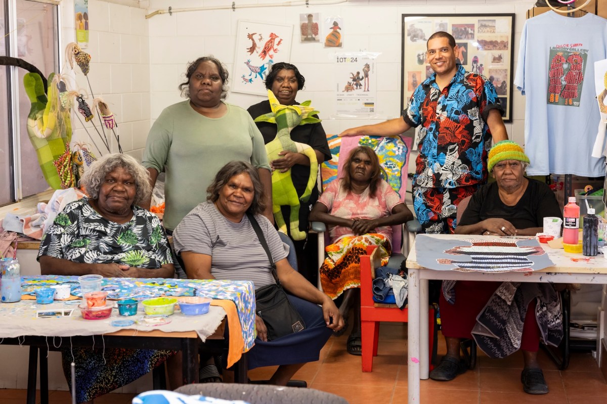 Group of Aboriginal women and one man in artist studio. Indigenous Triennial