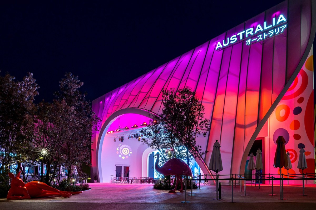 exterior of building with pink and red lighting. Australian Pavilion World Expo 2025