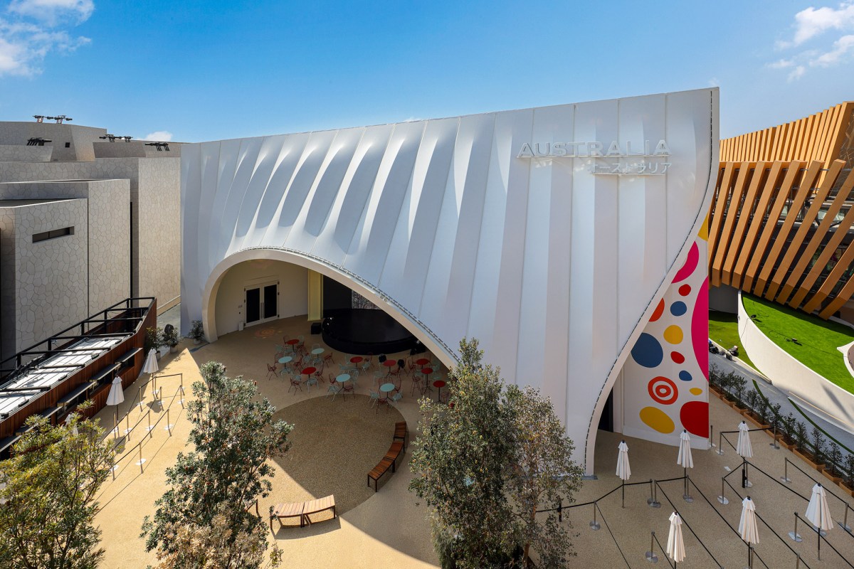 Exterior of Pavilion building with fluted arc roof. World Expoi 2025