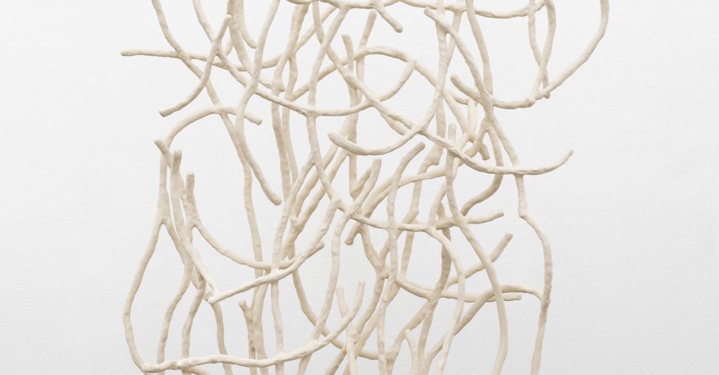 Cream, two-like sculpture.