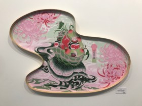 A swirly globule-shape painting in shades of pink featuring a turtle. The artwork is part of the joint exhibition Masakatsu Sashie and Creature Creature: Auspicious Delicious, currently showing at Melbourne's Outré Gallery.