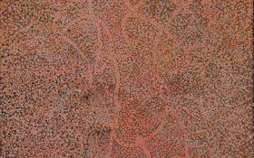 An Aboriginal dot painting with earthy tones.