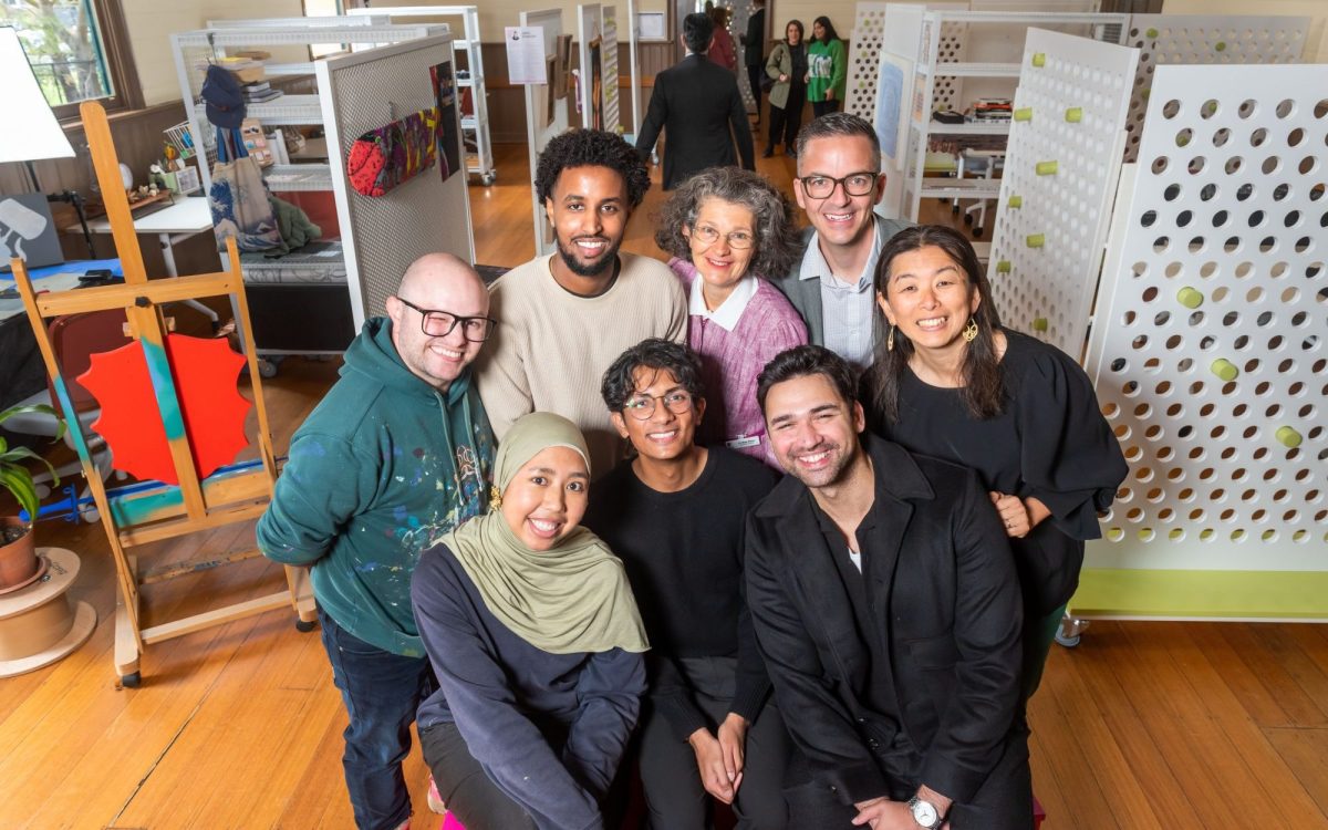 A group shot of artists with Cr Kim Ross and Mayor Cr Stefan Koomen at the new creative hub.