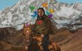 A saturated painting of a realistic portrait, featuring an Asian man sitting on a horse against the backdrop of a snow-capped mountain. He is surrounded by colourful cartoon birds by his head.