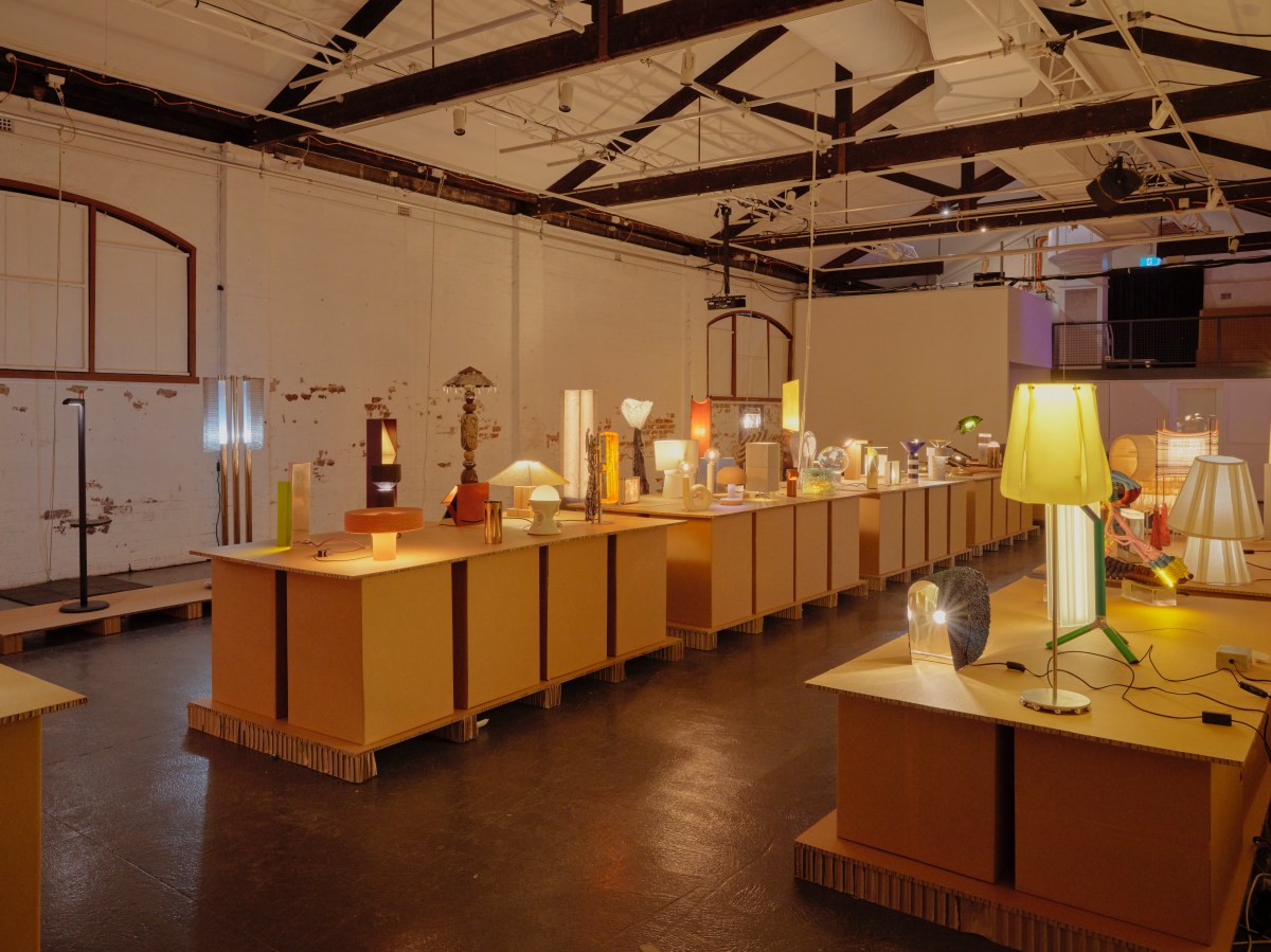 An installation of three rows filled with lights by different designers.