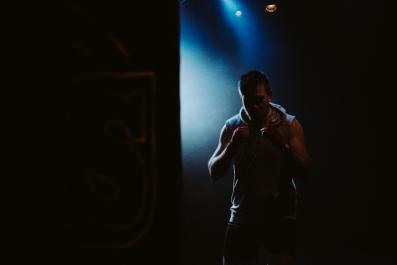 A boxer in silhouette.