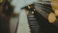 A sideways photo of a piano.