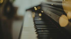 A sideways photo of a piano.