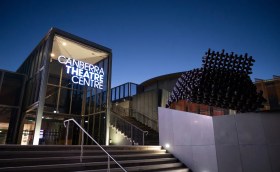 The outside of a modern looking theatre at dusk. Canberra Theatre Centre.