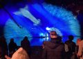 Crowds watching Water Stories, projections on mist over water, at Lightscape Royal Botanic Gardens 2025
