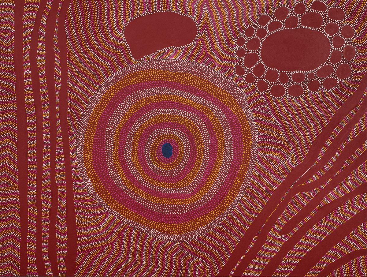 Aboriginal artwork that's earthy red with dots and swirls.